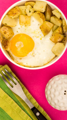 Fried Egg With Fried Potatoes In A Bowl