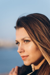 Young pretty blonde walking outdoors