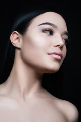 Portrait of a young girl with lush lips and long eyelashes. Perfect fresh young skin.