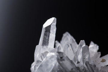 Big natural double quartz crystal isolated on white.