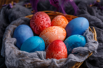 Original Easter eggs in a wicker basket.