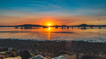 Dawn Waterscape over the Bay with Boats