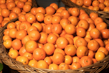 Bunch of fresh mandarin oranges on market