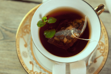 Cup of tea on wooden table
