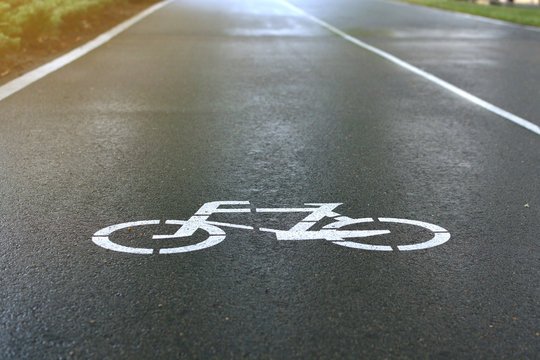 Bicycle road. Bicycle sign, bicycle sign painted on road surface.