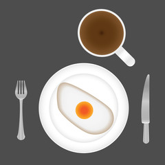 Top view of fried eggs for breakfast on plate, with fork and knife. Cup of coffee