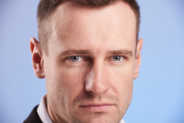 Fototapeta premium Macro portrait of seriuos man