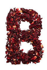 English alphabet. Letter B from dried flowers of hibiscus tea on a white background. Letters for banners, advertisements