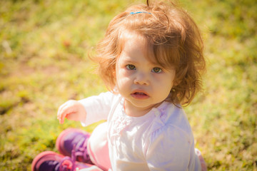 Portrait of baby girl in park