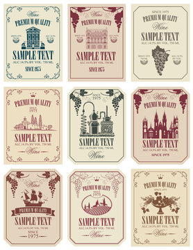 Fototapeta Vector set of wine labels with the image of grapes, winery, castle, sailboat, landscape, fruits and other in retro style in frames with curls