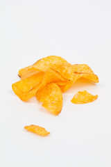 Fototapeta na wymiar Isolated golden crunchy chips