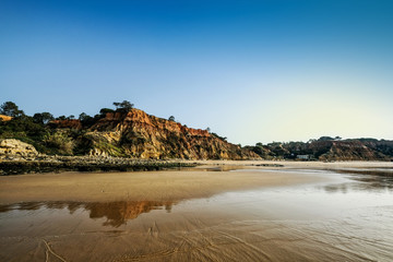 Landscape with Cliff and Dunes at the Beach near Albufeira Portugal in Summer