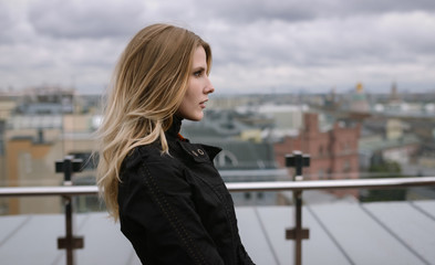 Outdoors portrait of beautiful young woman. Selective focus.