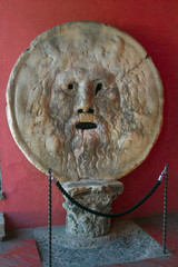 Famous ancient masterpiece Mouth of Truth sculpture in Rome indoors