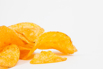 Isolated golden crunchy chips