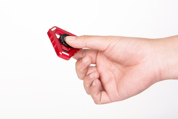 Hand holding fidget spinners