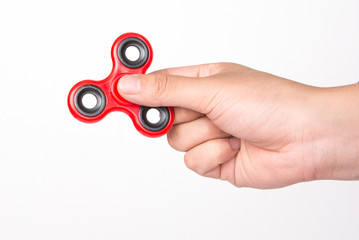 Hand holding fidget spinners