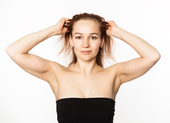 Fototapeta premium gymnastics for a face, woman doing anti-aging exercises. beauty and health concept