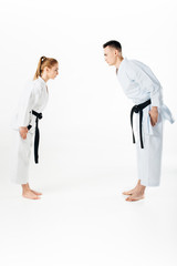 karate fighters greeting each other isolated on white