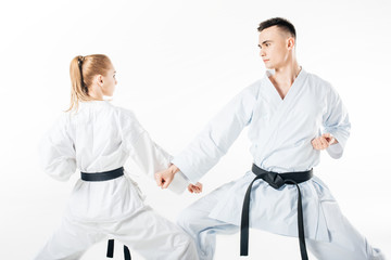 karate fighters training block isolated on white © LIGHTFIELD STUDIOS