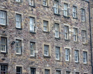Fototapeta na wymiar Example of Scottish Architecture, Stonework facade of random building in centre of Edinburgh, Scotland