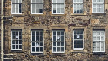 Fototapeta na wymiar Example of Scottish Architecture A, Stonework facade of random building in centre of Edinburgh, Scotland