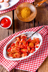 sausage in curry sauce