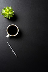Obraz na płótnie Canvas Office desktop with cup of coffee. Top view