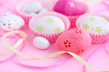 Festive background with easter eggs and ribbons