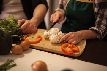 Family in kitchen.