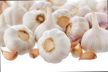 background of garlic a lot of garlic on a white background