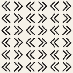 Fototapeta na wymiar Hand drawn style ethnic seamless pattern. Abstract grungy geometric background in black and white.