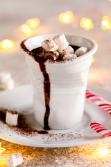 Hot chocolate with melted marshmallow Christmas Background Holiday Candy cane Warming Winter Drink