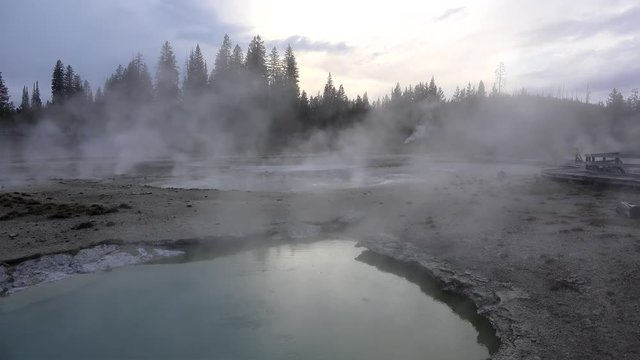 West Thumb Paint Pots in Yellowstone NP at dusk. Wyoming, USA