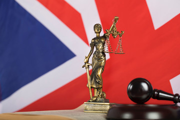 Statue  Themis on a flag of Great Britain.