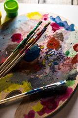 Fototapeta premium brush against the background of the palette