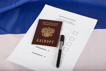 Russian passport on a approximate sample of ballot paper for presidential elections.