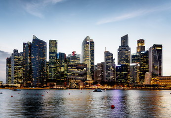 Fototapeta na wymiar Wonderful evening view of Marina Bay and downtown of Singapore