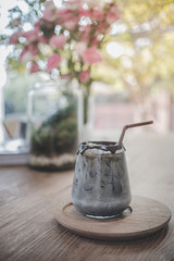 Iced coffee cafe latte in white coffee beans Delicious coffee with ice