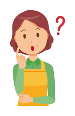 A middle-aged housewife wearing an apron is thinking