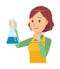 A middle-aged housewife wearing an apron has an erlenmeyer flask