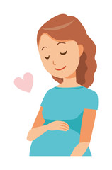 A pregnant woman wearing green clothes is gently stroking her belly