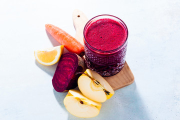 healthy freshly squeezed Juice from Beets, carrots, apples and lemon. detox program, healthy eating, concept of vegans