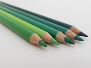 Five green pencils