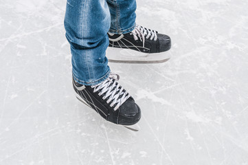 Man legs in ice skates