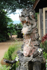 Obraz premium Deva stutue and the leelawadee flower in left hand.