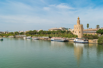 Obraz premium Guadalquivir river Seville Tower Triana bridge Seville Spain