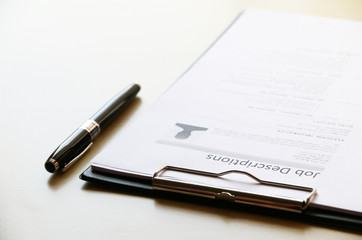 job description paper on table Office Business