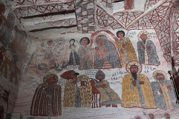 TIGRAY REGION, ETHIOPIA - February 06, 2018: wall murals of saints and iconographic scenes, painted...