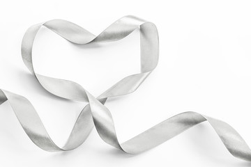 Silver heart ribbon isolated on white background (clipping path) for Valentine day greeting card...